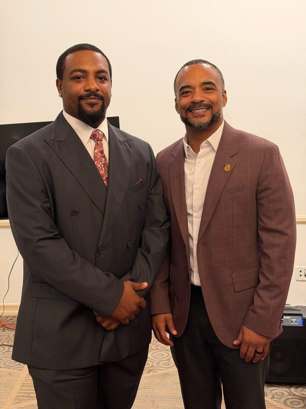Two business professionals at an industry meeting