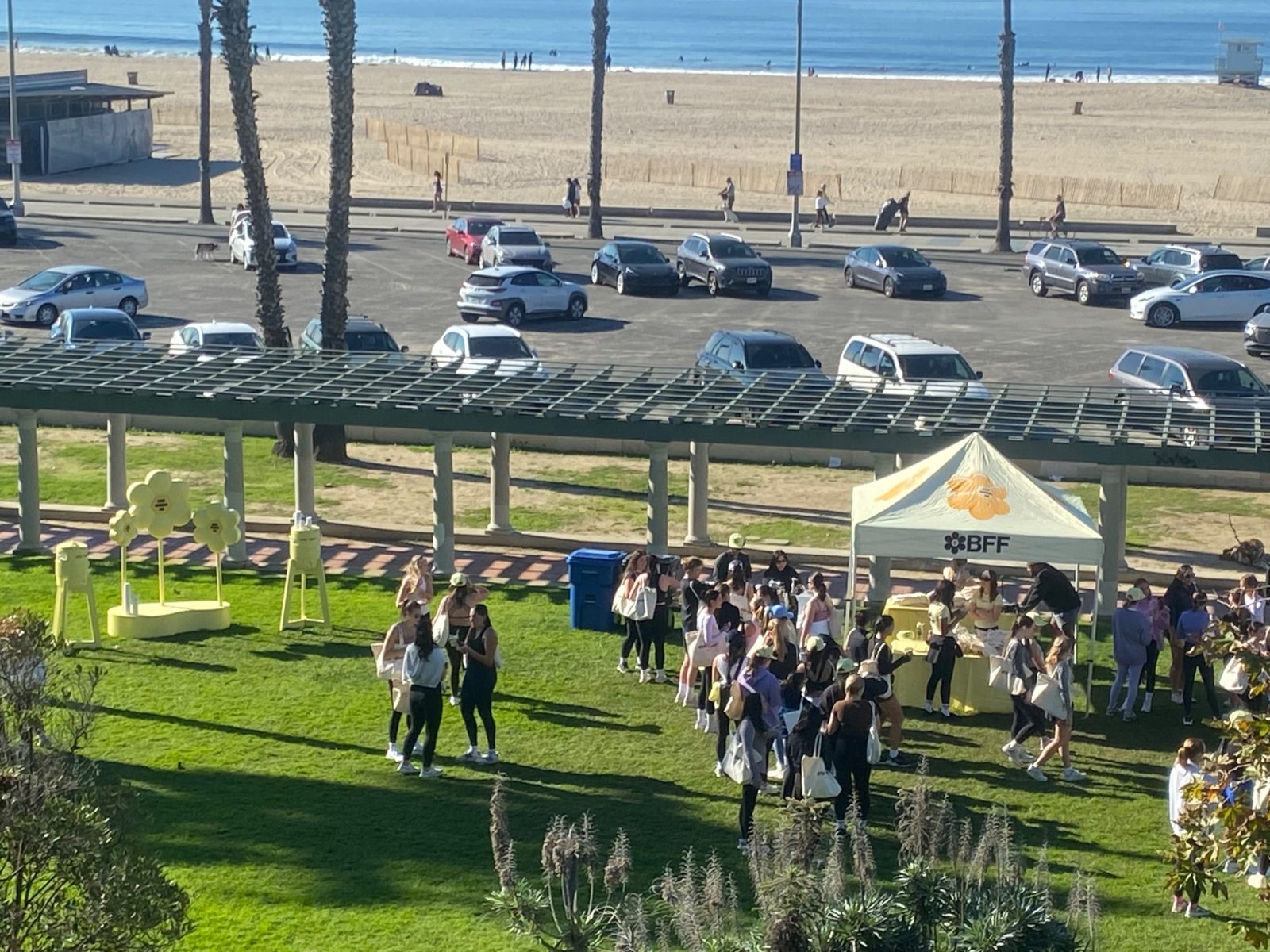 Outdoor BFF pop-up event with audience near the beach